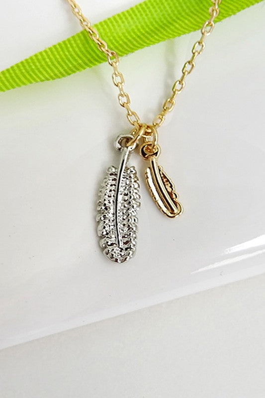 TINY FEATHER CHARM NECKLACE